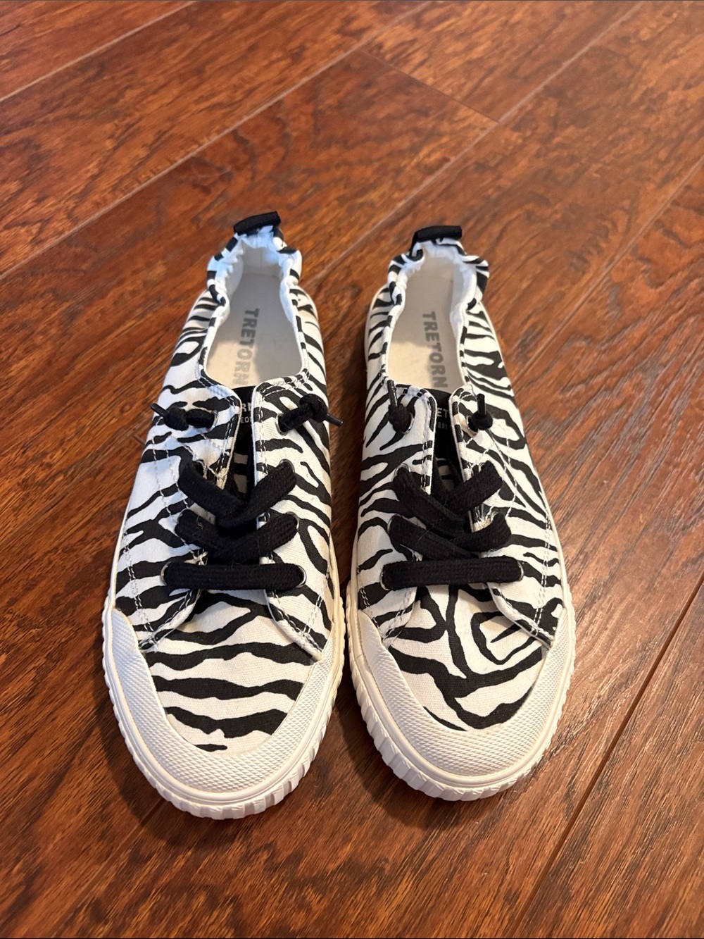 Tretorn zebra print slip on shoes
